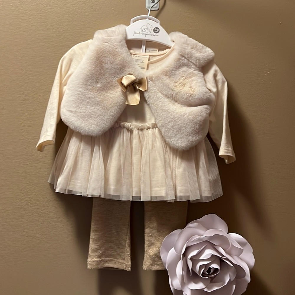 Cream outfit set with a fuzzy vest